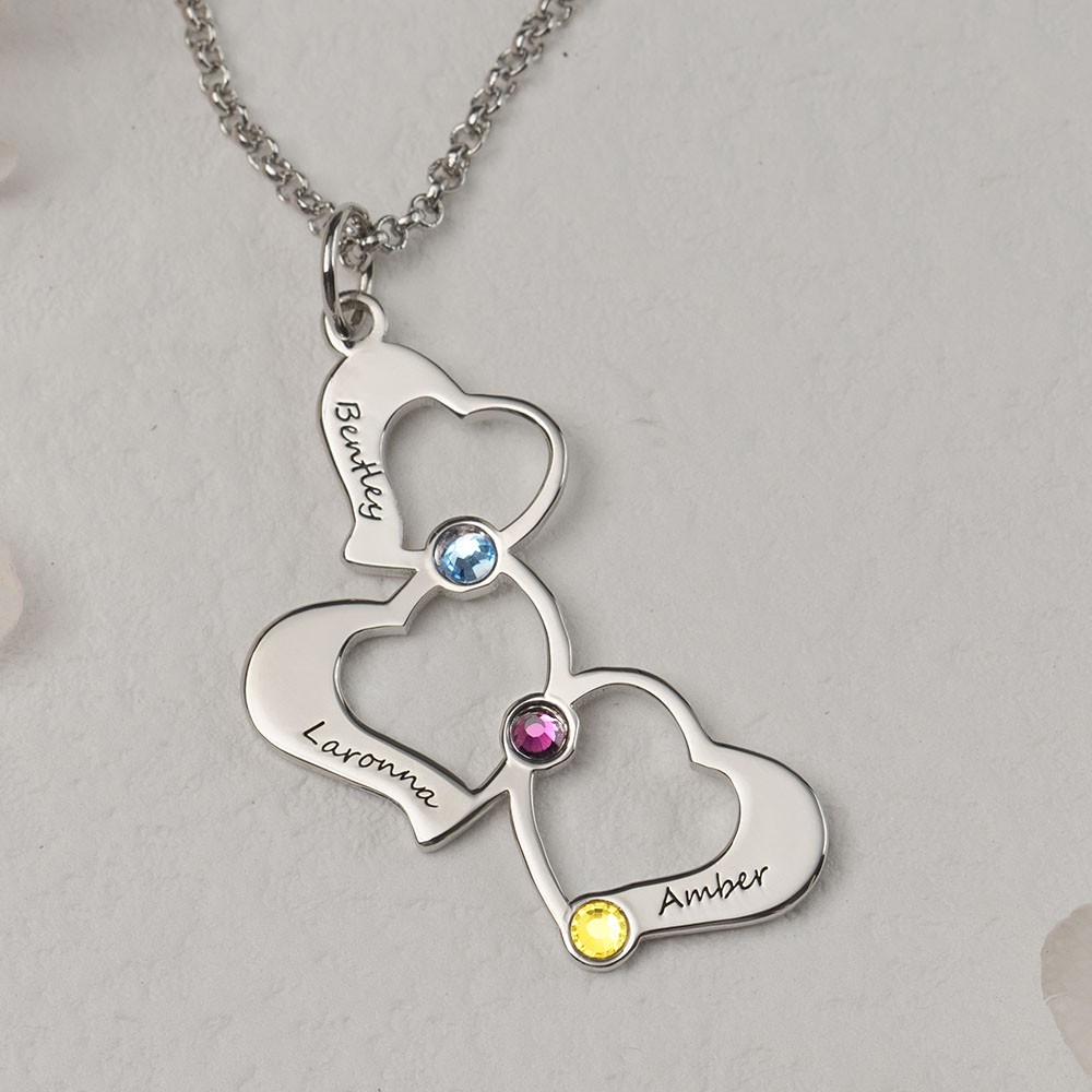 Regalo di Natale con collana a cuore con nome di famiglia personalizzato in argento